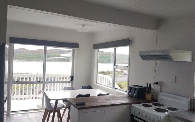 Karoro the Beach Front Bach with Views To Die For! – Balcony – Raglan