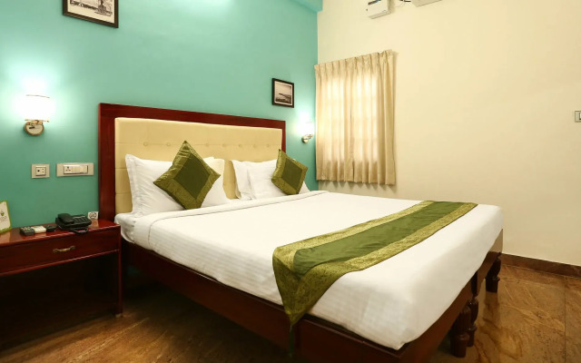 Treebo Grace Inn, 3 Min Walk From Promenade Beach