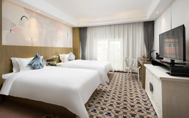 Paco Business Hotel - Longkou West