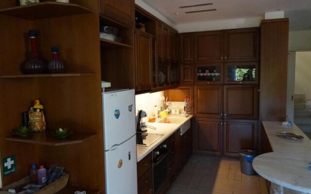 Apartment with a garden, BBQ, swimming pool and jacuzzi