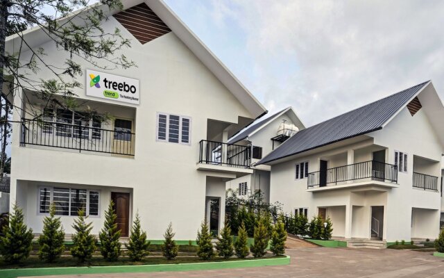 Treebo Trend The Hazeberg Munnar With Mountain View