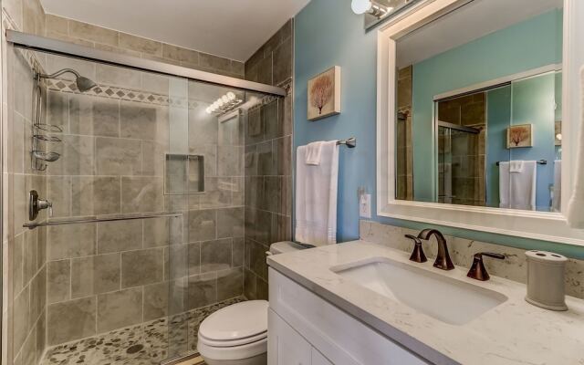 Newly Remodeled Oceanfront Condo with Salt Water Pool and Private Walkway to Beach by RedAwning