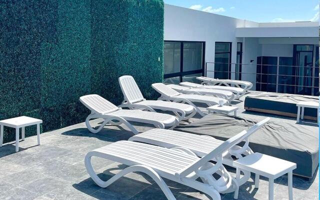Fresh and Stylish Studio Aldea Zama rooftop pool Mya 109