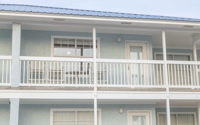 Sun Kissed Beachside Condo With Pool