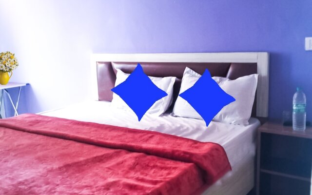 Roomshala 021 Hotel Joyous Inn