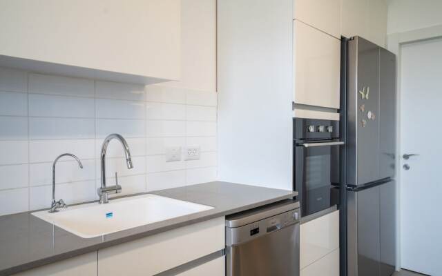 Vibrant Seaside Stay with Balcony by Sea N' Rent