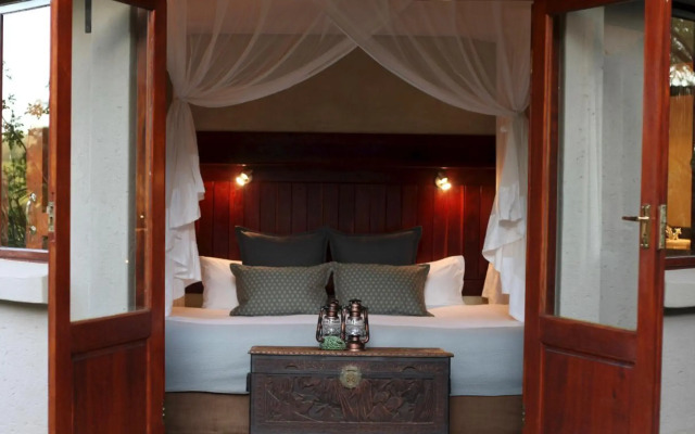 Ivory Wilderness River Rock Lodge