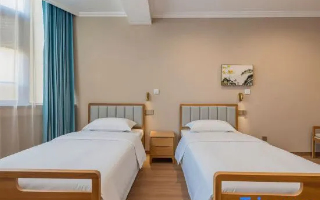 Qingdao Shengde Debao Garden Langham Apartment (May Fourth Square) — 3-star hotel in Qingdao