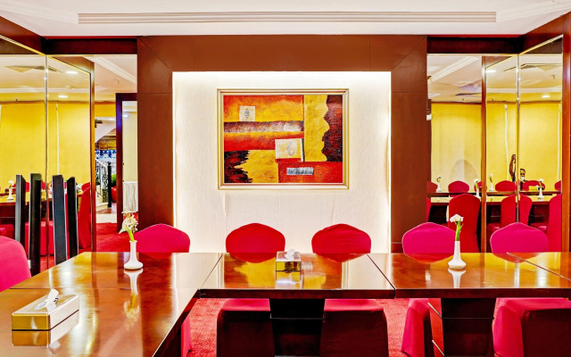 Capital O 596 Garden Palace Hotel