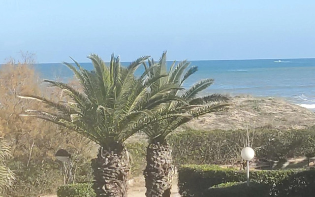 Residencial OlivalAcceso privado playa por jardín