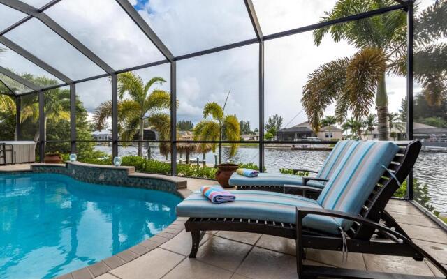 Villa Neptune's Grotto- BRAND NEW with heated Pool, Hot Tub, and dock with Tiki