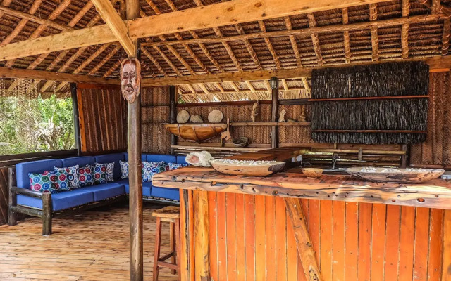 Saadani Safari Lodge - bush, river, beach