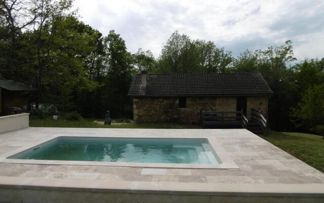 Stone holiday home in Saint Cernin de l Herm with pool