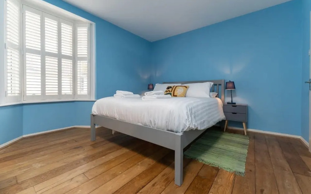 Host Stay Blue Hues on Over Street