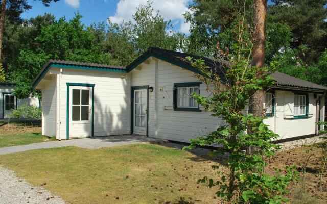 Well-furnished chalet with terrace near a recreational lake