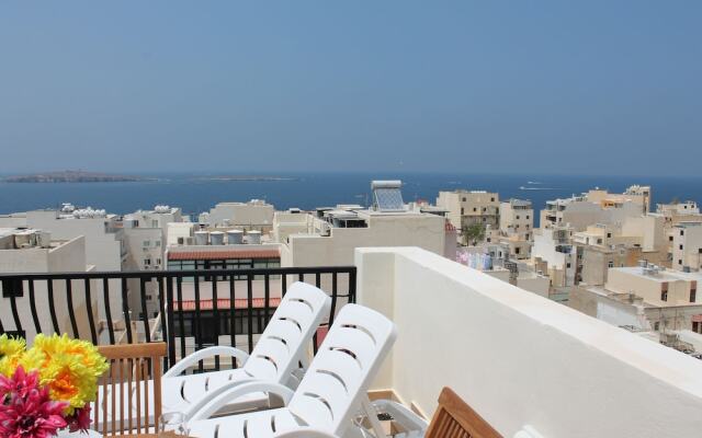 Seashells 2 bedroom Apartment with sunny terrace with stunning panoramic sea views by Getaways Malta