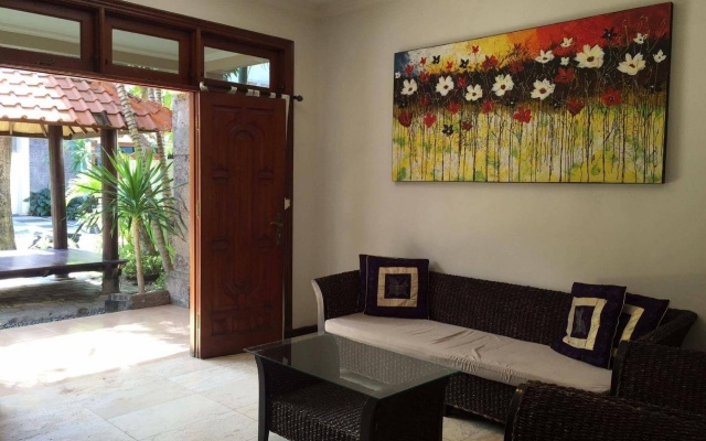 Kuta Holiday Villas – Guest Rooms – Kuta