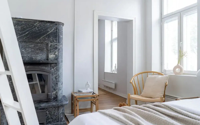 A bright wooden studio for four