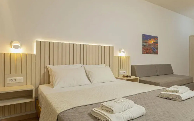 Theos village apartments