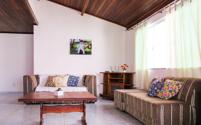 Casa com 4 Suítes, Piscina, Área Gourmet e Wifi