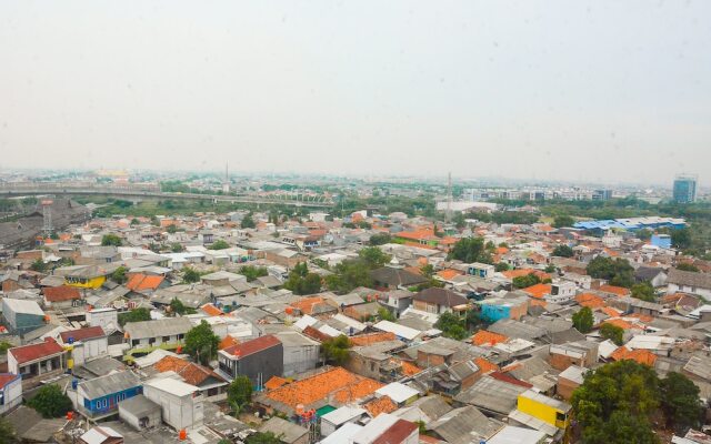 Comfy Studio Room at Patraland Urbano Apartment