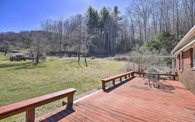 Quaint Creekside Home w/ Spacious Deck & Yard