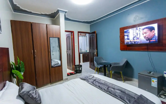 The Den Soroti White