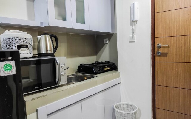 Homey and Comfy 2BR at Vida View Apartment