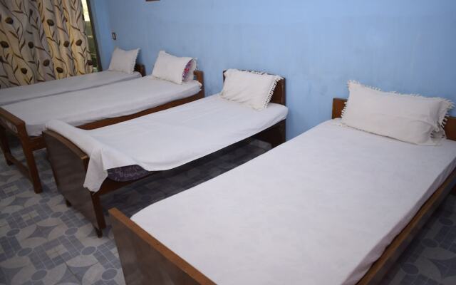 Parisha Residency - Temple Side Hotel