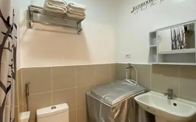 Cozy 1 BR Apartment At South Residences Tower 2