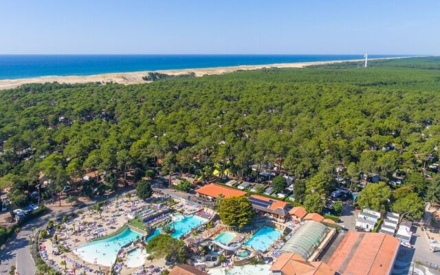 Cozy Mobile Home With Covered Terrace on a Luxury Campsite