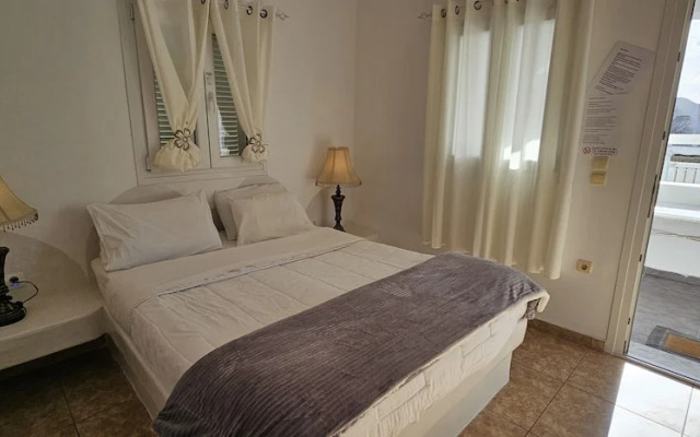 Santorini Studios Pleasure By The Sea