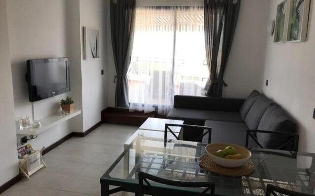 Apartment in Taurito with dream landscape and 30m2 terrace.