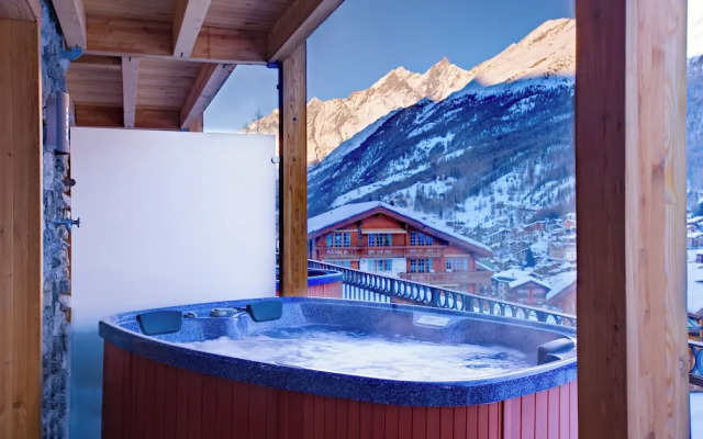 Mountain Exposure Luxury Chalets & Penthouses & Apartments