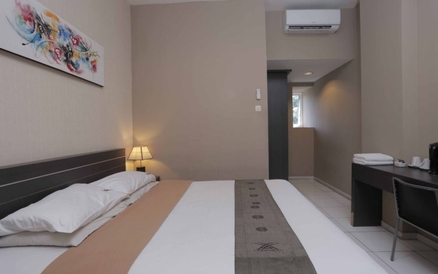 RedDoorz @ Sunset Point Seminyak – Guest Rooms – Kuta