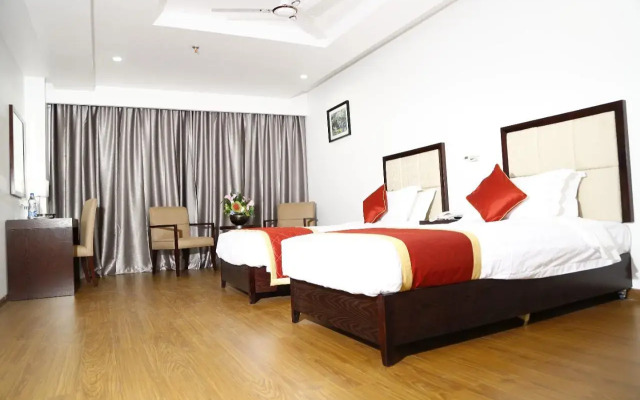Triguna Clarks Inn