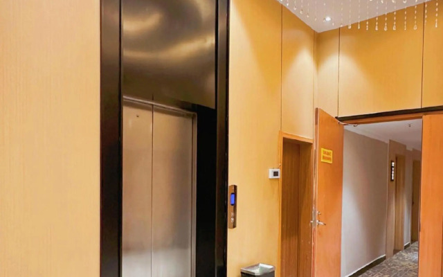 Wanjia Business Hotel (Zaozhuang Maoyuan)