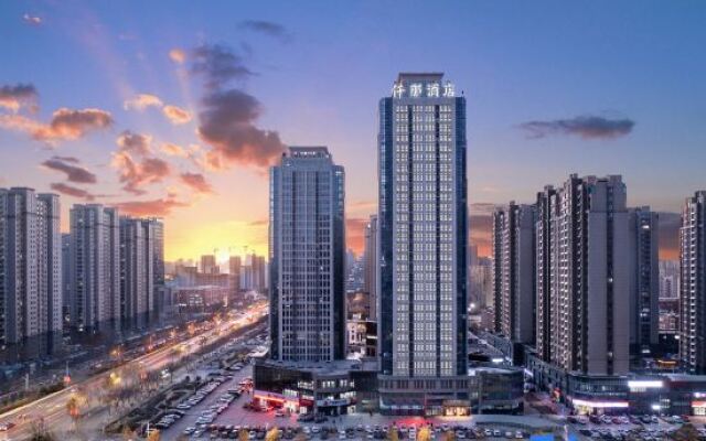 Qianna Meisu Hotel (Xinxiang Municipal Government High-speed Railway Station)