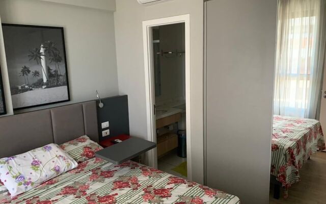 Quarto e Sala Particular em Aparthotel