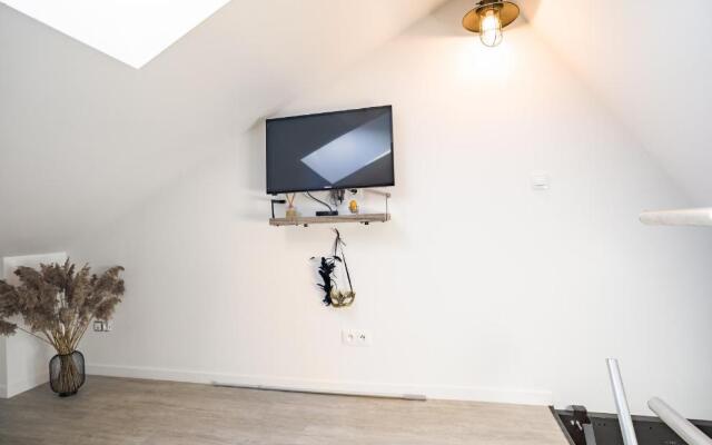 Loft avec jardin et parking privé