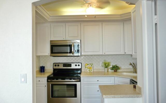 Beachfront Condo With Views of Beach and Spacious Pool