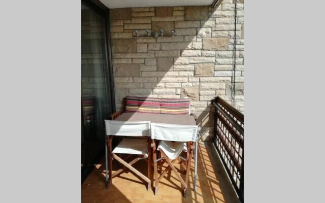 Apartament a Roses. Terrassa i piscina comunitaria