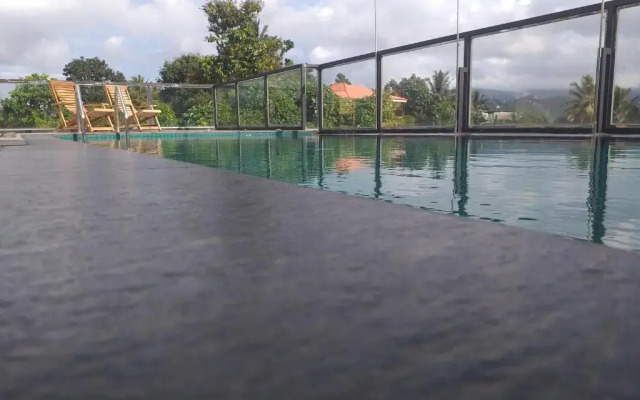 OYO 557 De Mansion