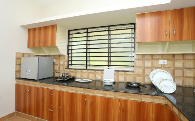 Srinilayam Apartments By OYO Rooms