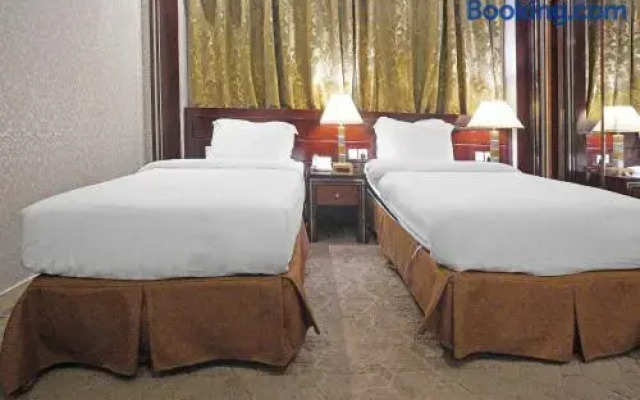 Capital O 596 Garden Palace Hotel