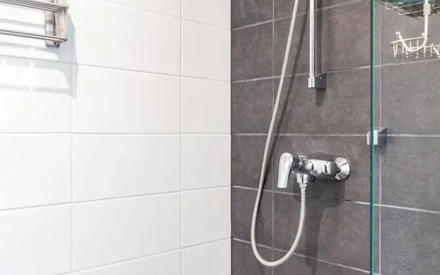 Modern 1BR Home with Sauna & Balcony