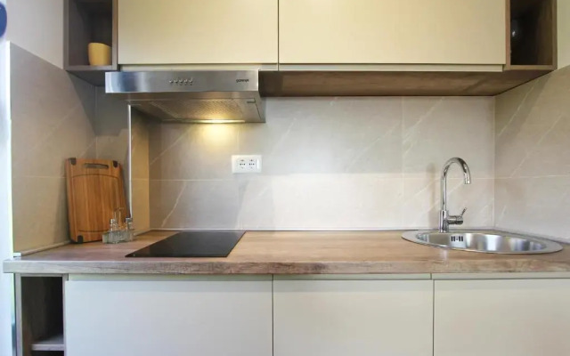 Minimalist stylish 1 BR apartment in Tre Group