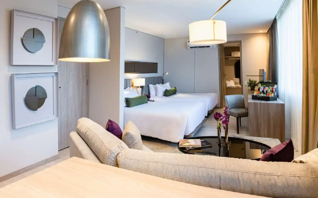 York Medellin, Curio Collection by Hilton