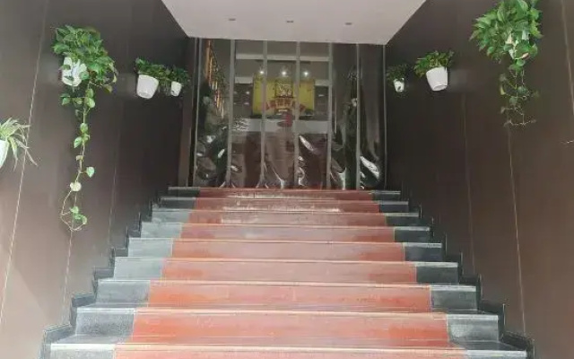 Defu Business Hotel (Yilong Xinzhengzhen Branch)