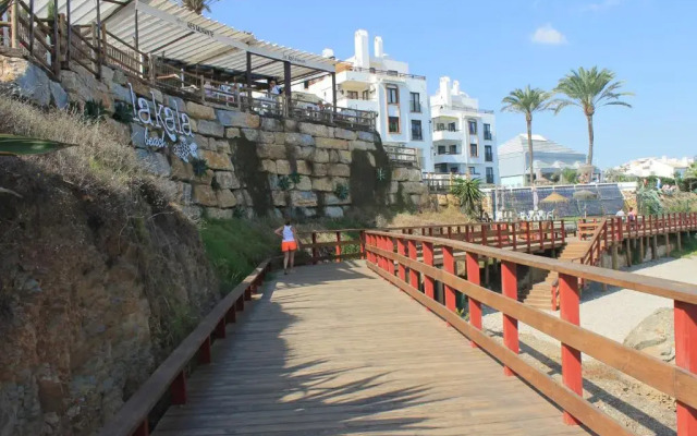 APARTMENT La CALA DESING a 150 m. del MAR.